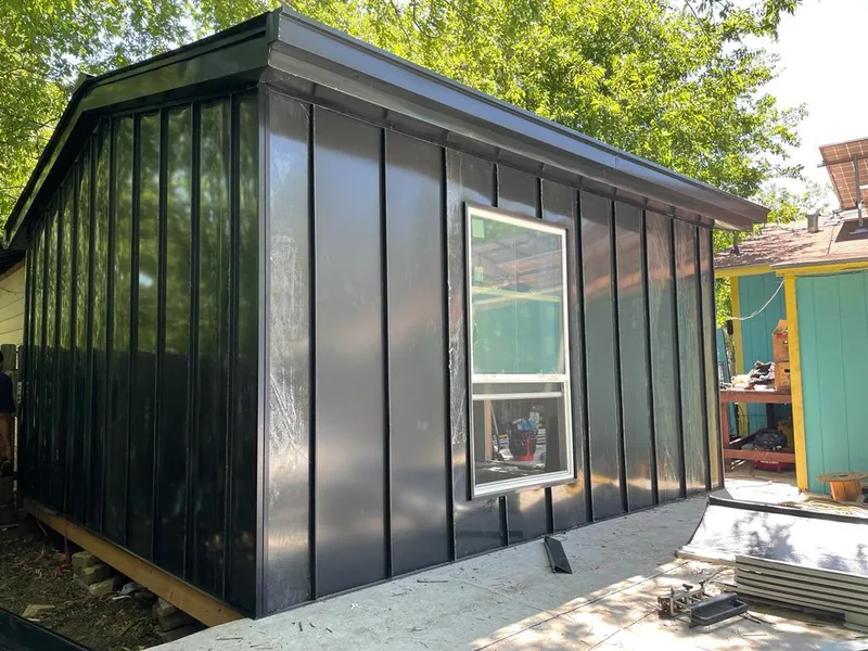 Black standing seam metal wall panels for Roof Inspection in Lake Elmo