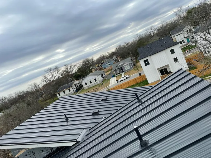 Standing seam metal roof panels with vents for Skylight Repair in Lake Elmo